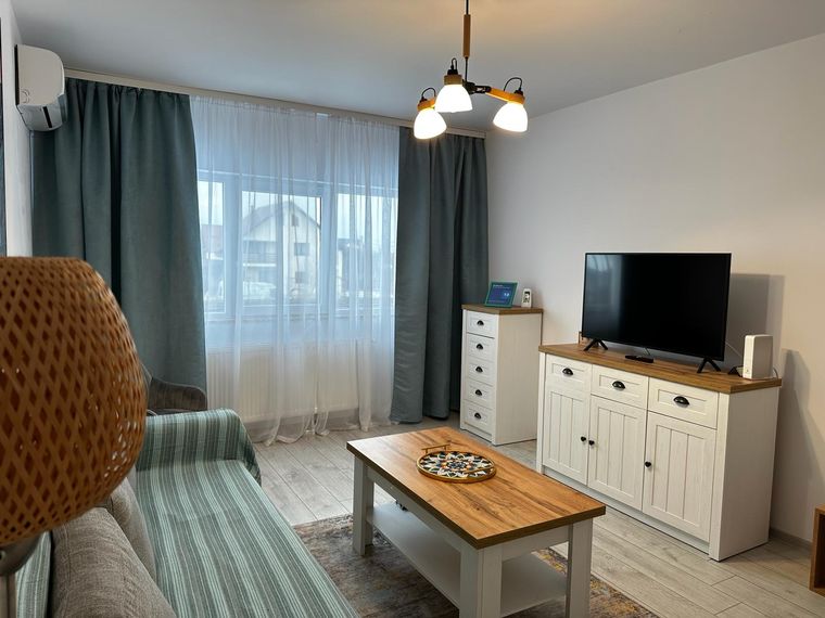 Cazare delegație Suceava cu factură – Best Apartment Suceava, living